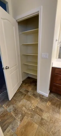 a view of a refrigerator in a kitchen