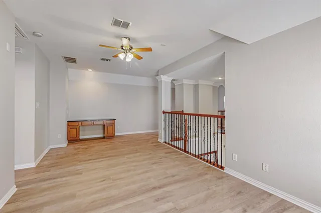 a view of a livingroom with a ceiling fan
