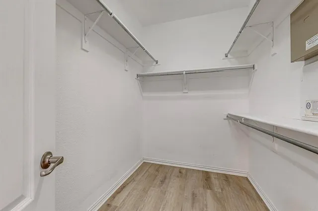 a view of a room with racks on the wall