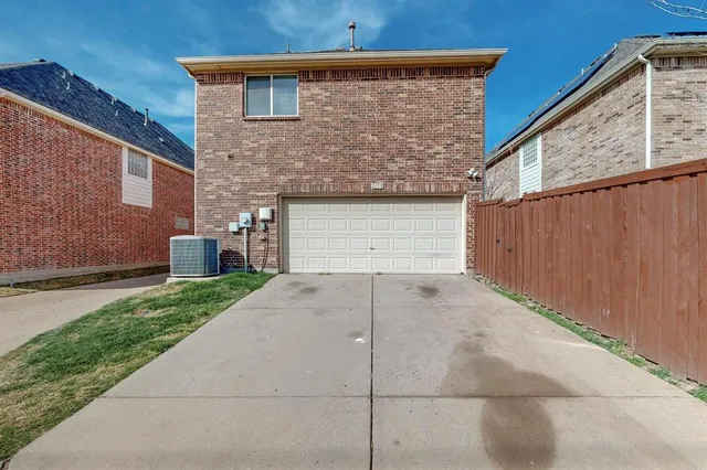 a front view of house with a yard