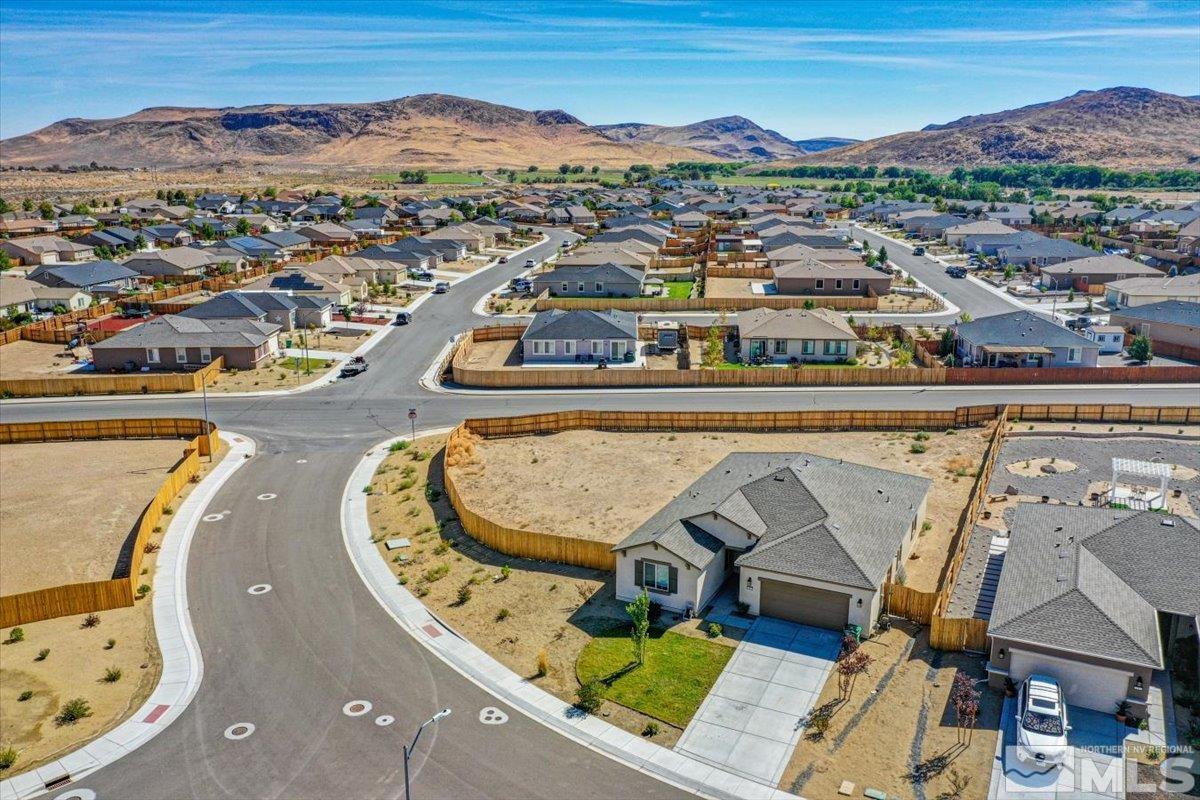 119 Oakmont Drive Dayton, NV 89403 - Photo 18 of 19 an aerial view of a swimming pool with a mountain view
