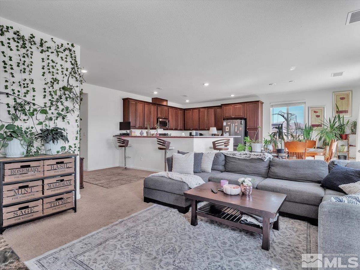 119 Oakmont Drive Dayton, NV 89403 - Photo 2 of 19 a living room with furniture and a view of kitchen