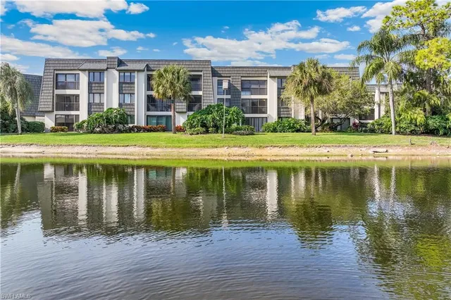 a view of a house with a lake view