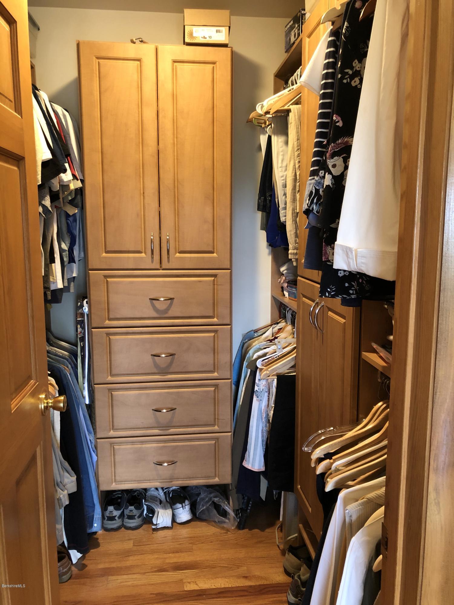 359 Harrington Road Otis, MA 01253 - Photo 28 of 60 a view of walk in closet with clothes and shoes