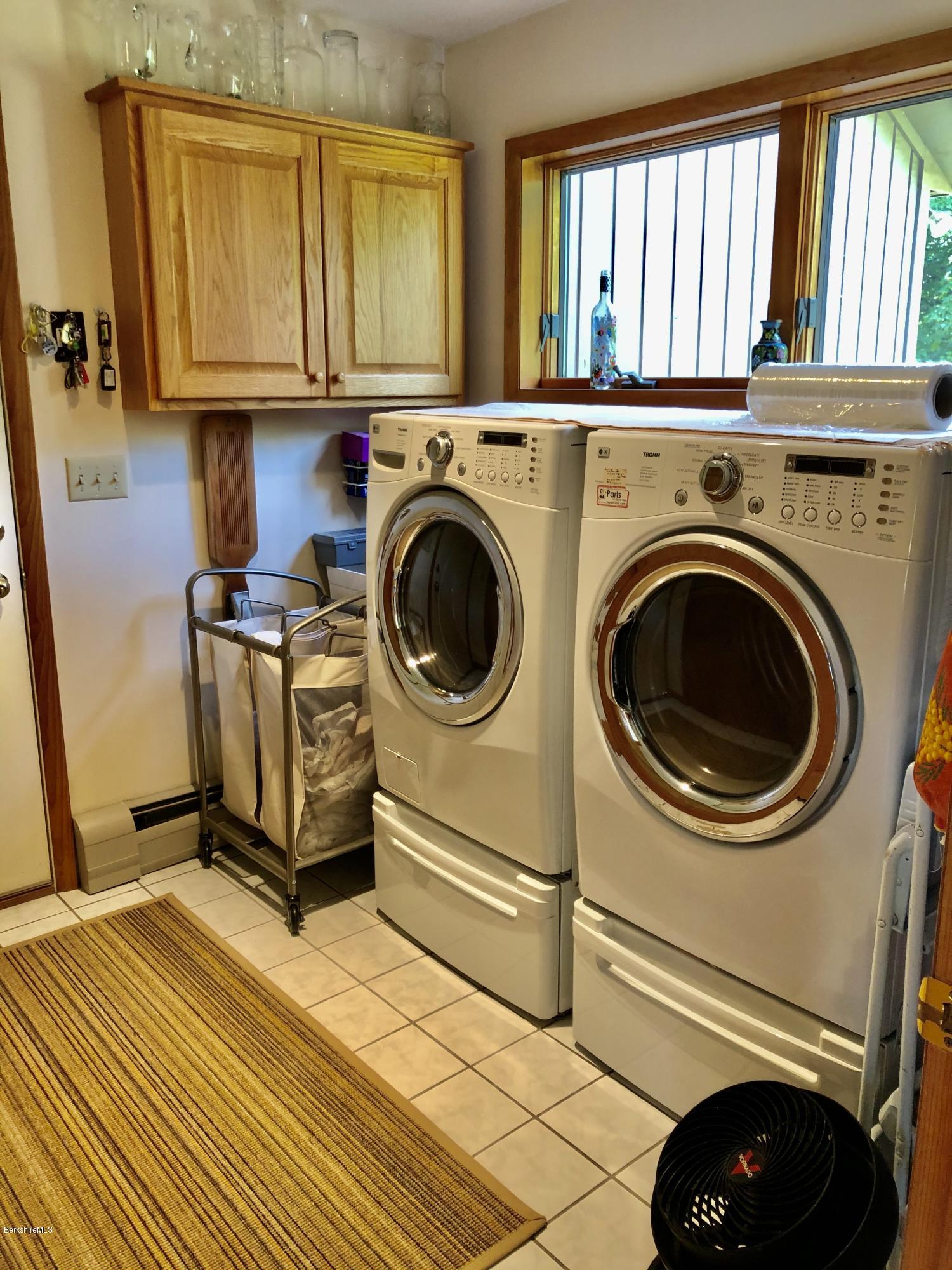 359 Harrington Road Otis, MA 01253 - Photo 51 of 60 a utility room with dryer and washer