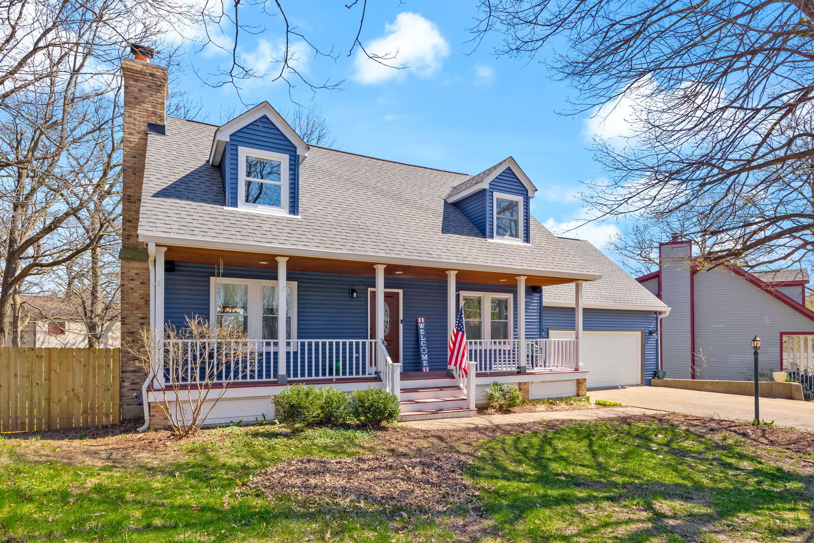 137 Forest Avenue Fox Lake, IL 60020 - Photo 1 of 35 a front view of a house with a yard