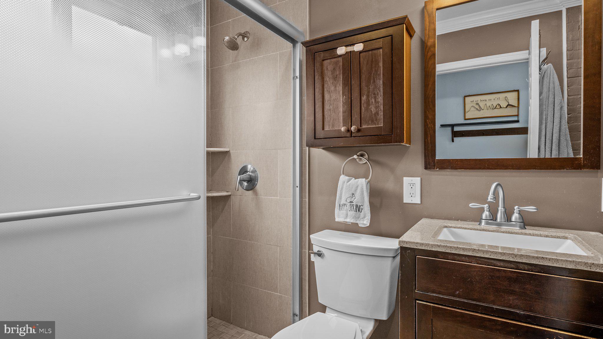 55 Grapevine Road Levittown, PA 19057 - Photo 16 of 27 a bathroom with a sink a toilet and shower