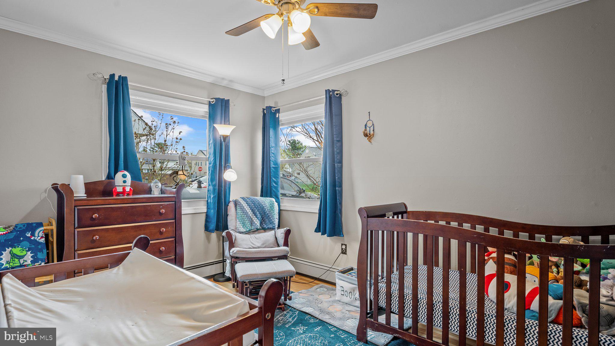 55 Grapevine Road Levittown, PA 19057 - Photo 18 of 27 a living room with furniture and a piano