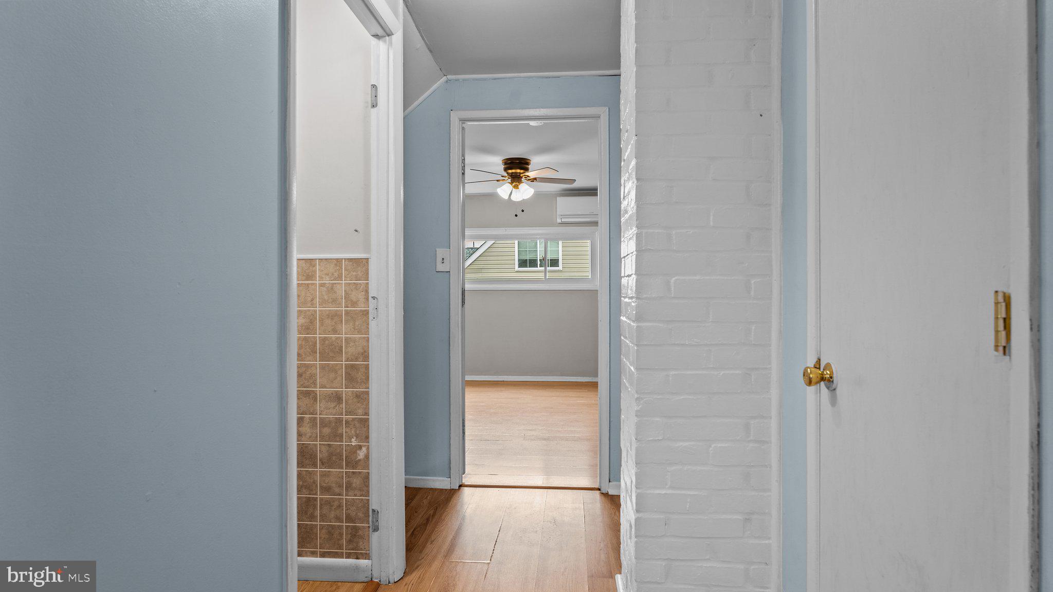 55 Grapevine Road Levittown, PA 19057 - Photo 20 of 27 a view of hallway with wooden floor
