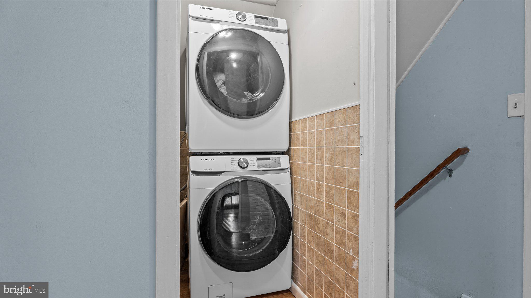 55 Grapevine Road Levittown, PA 19057 - Photo 21 of 27 a view of a hallway with washer and dryer