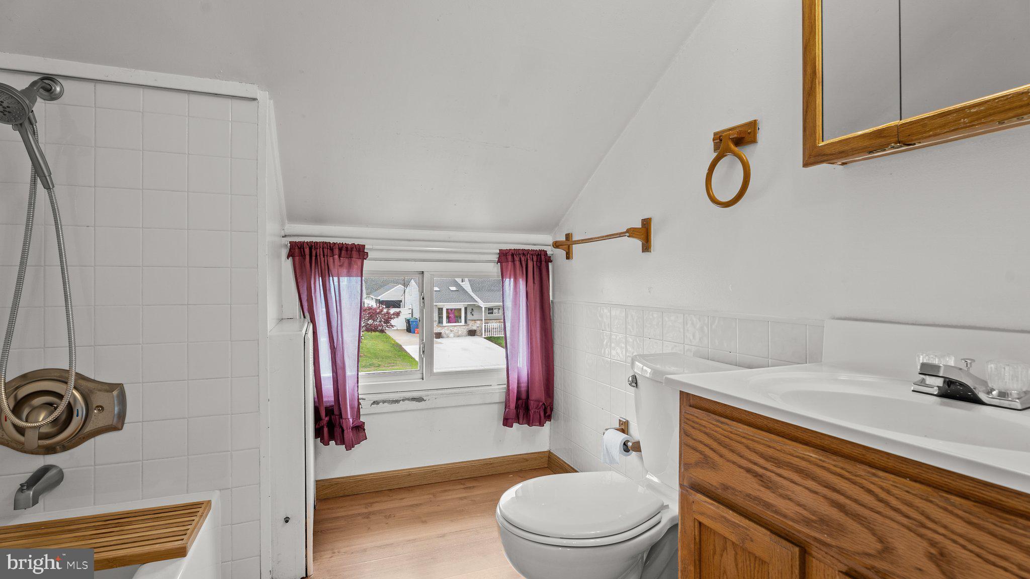 55 Grapevine Road Levittown, PA 19057 - Photo 22 of 27 a bathroom with a sink toilet and shower