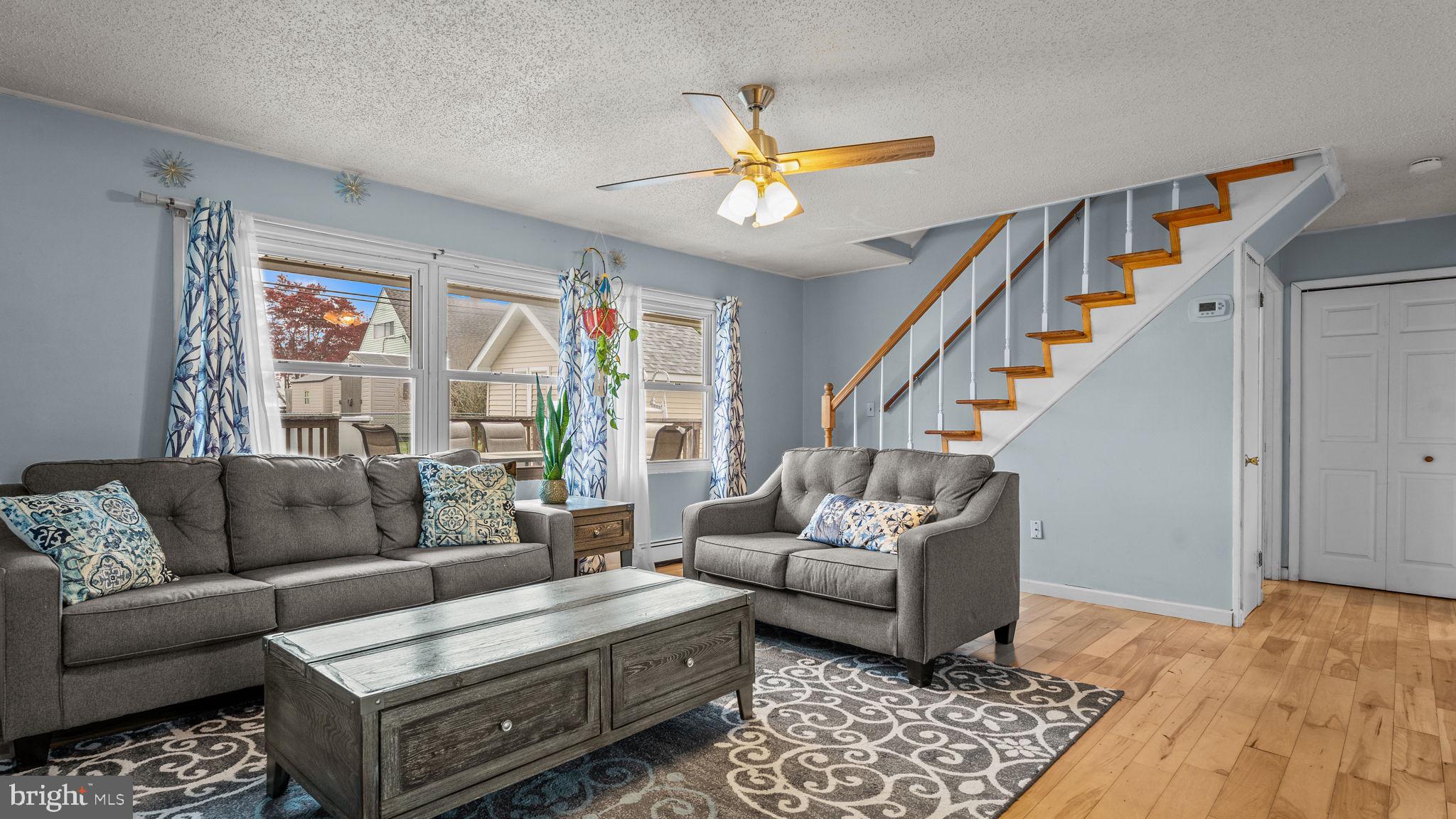55 Grapevine Road Levittown, PA 19057 - Photo 7 of 27 a living room with furniture and a rug