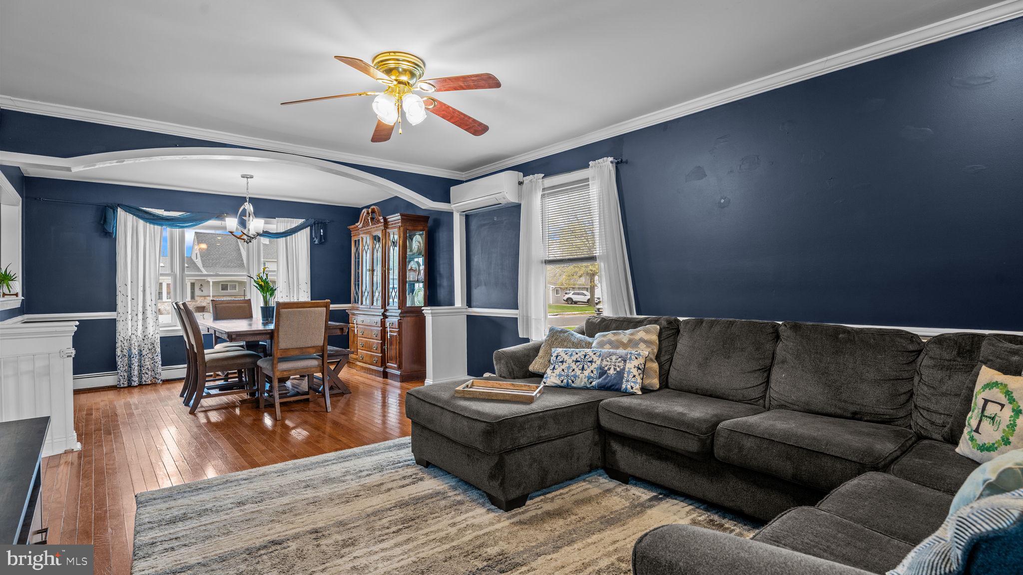 55 Grapevine Road Levittown, PA 19057 - Photo 9 of 27 a living room with furniture and wooden floor