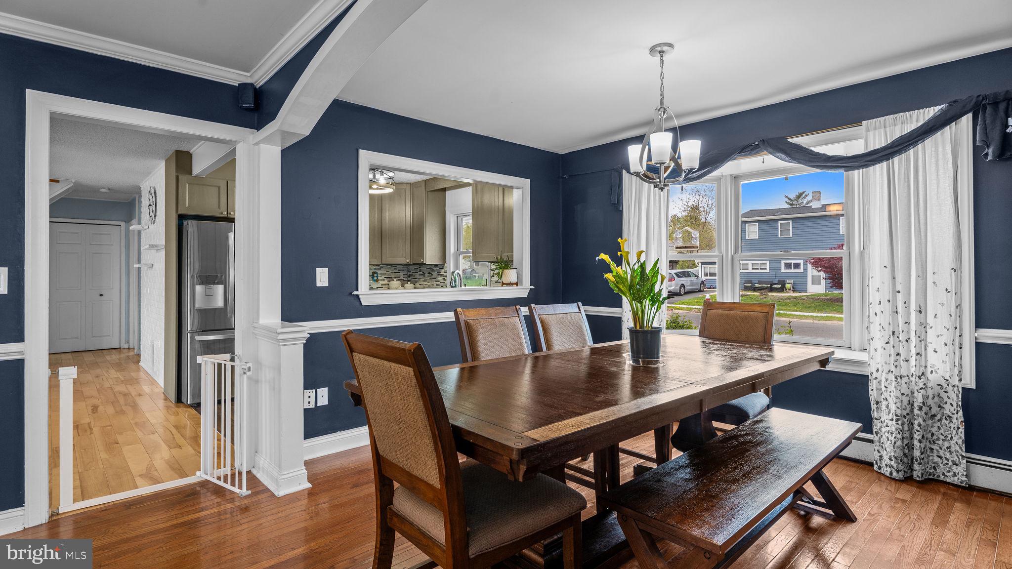 55 Grapevine Road Levittown, PA 19057 - Photo 10 of 27 a view of a dining room with furniture window and wooden floor
