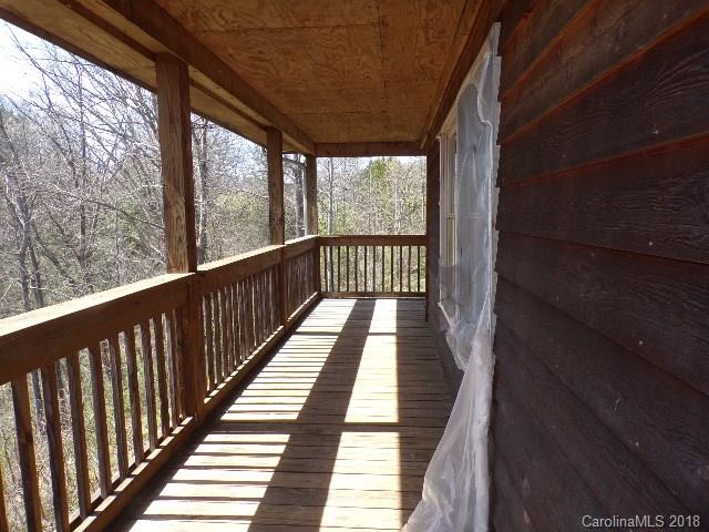 185 Mountain Mission Road Clyde, NC 28721 - Photo 18 of 23 a view of balcony with wooden floor
