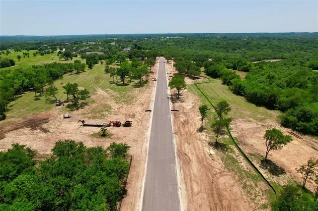a view of a garden with a lake