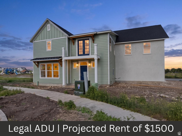 720 South Harrison Drive Springville, UT 84663 - Photo 1 of 14 Two-story residence featuring light green horizontal siding and white stucco facades