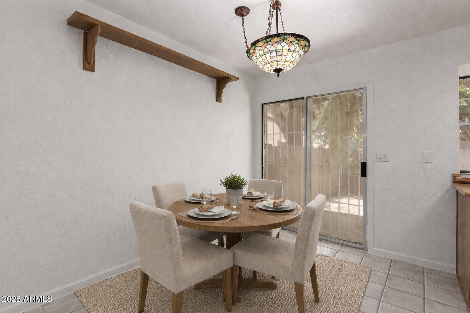 7977 West Wacker Road, Unit 244 Peoria, AZ 85381 - Photo 6 of 18 Virtually staged dining room