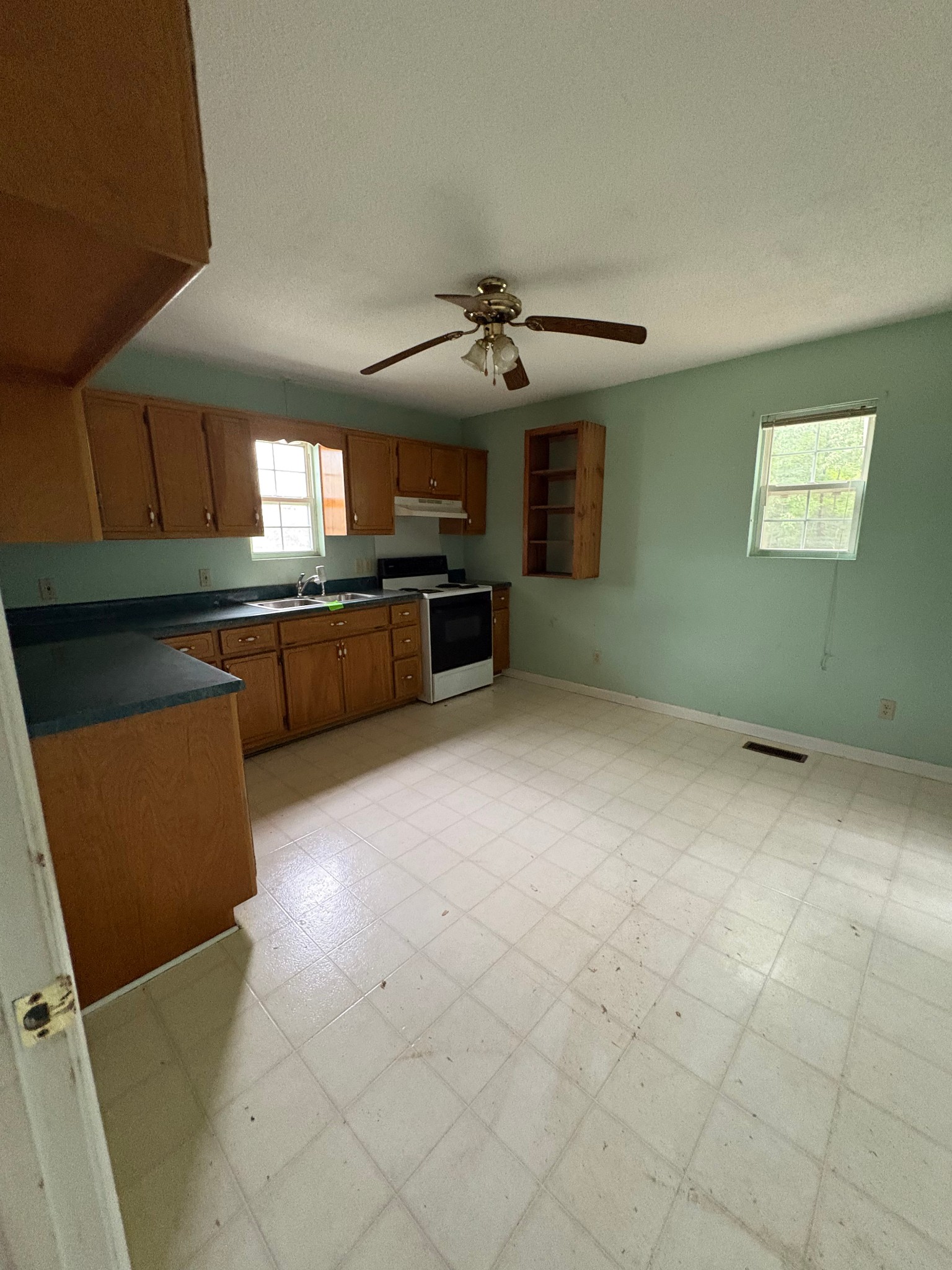 2174 Pleasant Hill Road Lynchburg, TN 37352 - Photo 8 of 16 a large kitchen with cabinets table and chairs