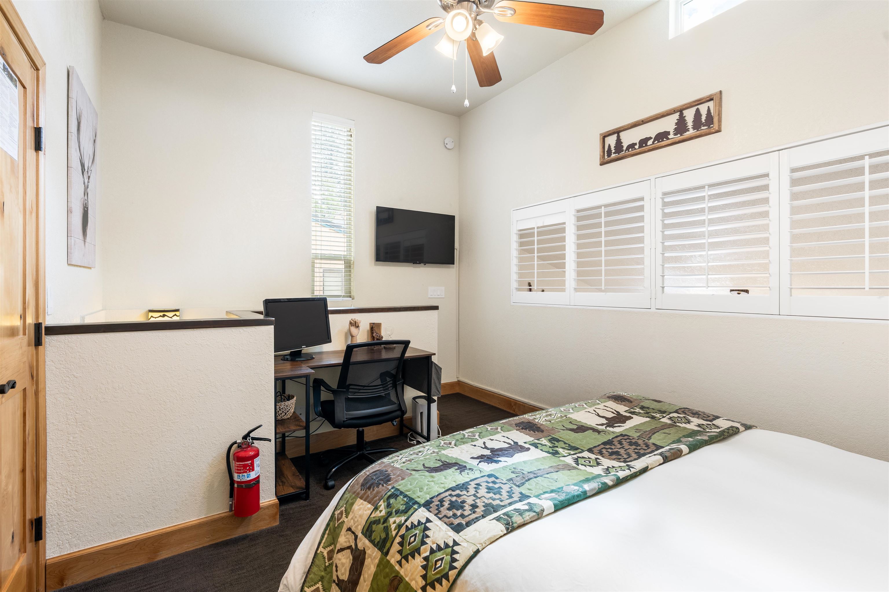 1300 Regency Way, Unit 37 Tahoe Vista, CA 96148 - Photo 20 of 27 a bedroom with a bed and a flat screen tv