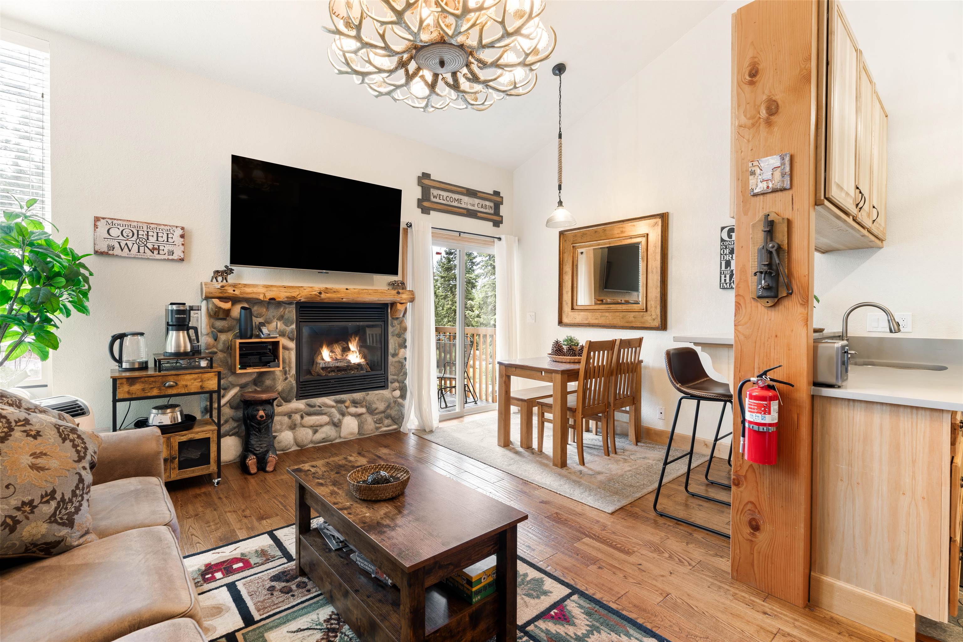 1300 Regency Way, Unit 37 Tahoe Vista, CA 96148 - Photo 2 of 27 a living room with furniture fireplace and flat screen tv