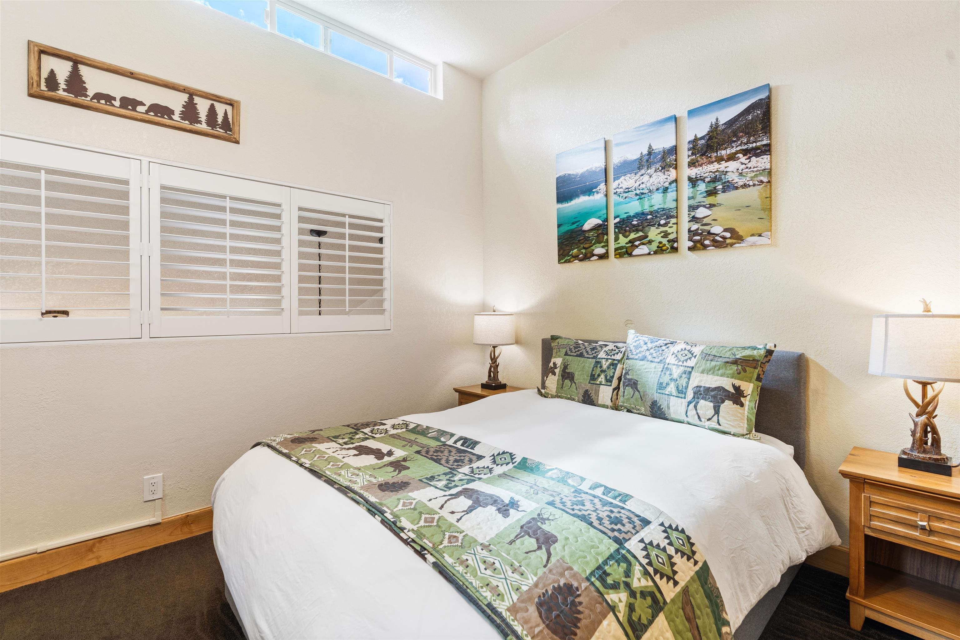 1300 Regency Way, Unit 37 Tahoe Vista, CA 96148 - Photo 21 of 27 a bedroom with a bed and a desk