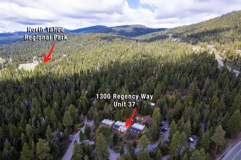 a view of a city and mountains in the background