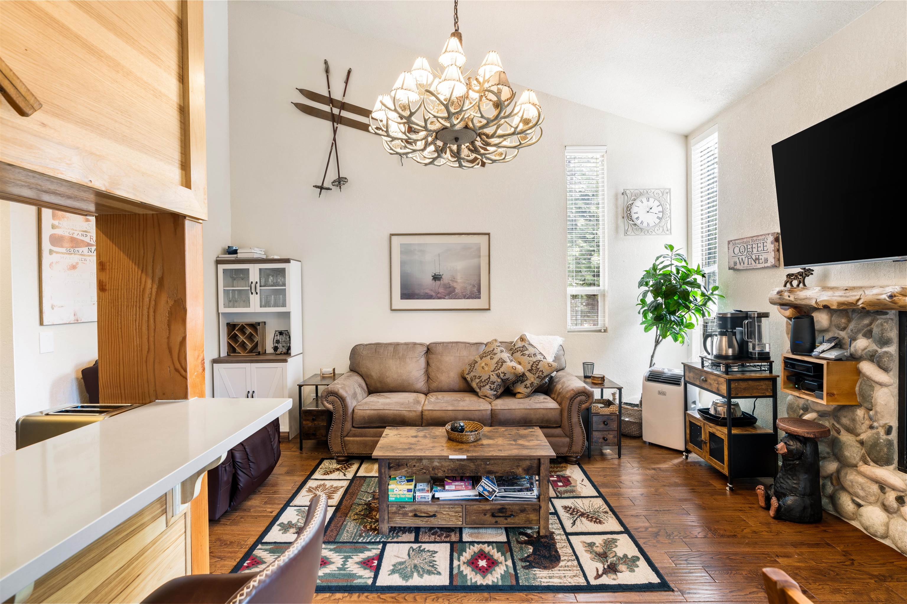 1300 Regency Way, Unit 37 Tahoe Vista, CA 96148 - Photo 5 of 27 a living room with furniture and a flat screen tv