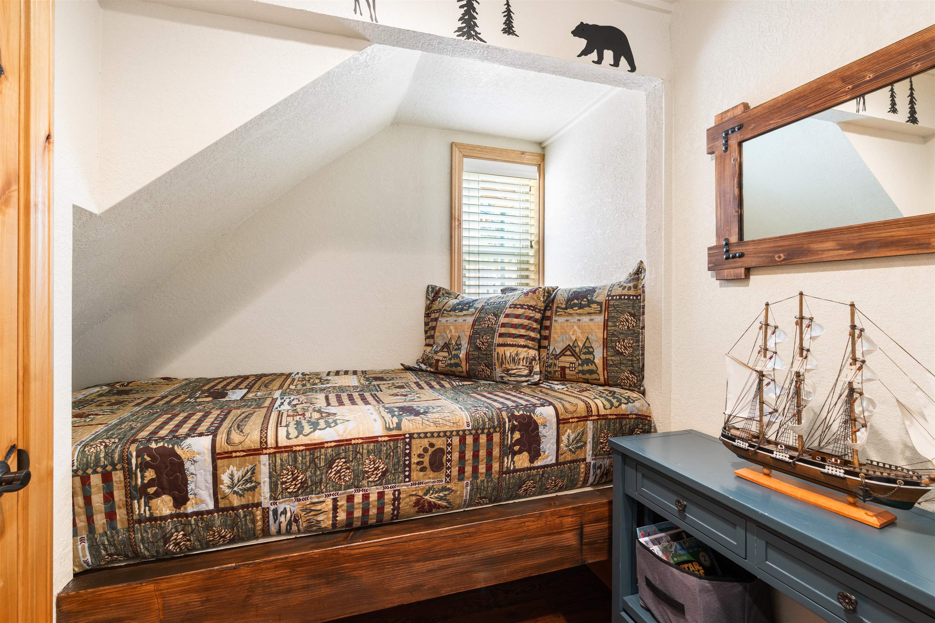 1300 Regency Way, Unit 37 Tahoe Vista, CA 96148 - Photo 9 of 27 a bedroom with a bed and a window