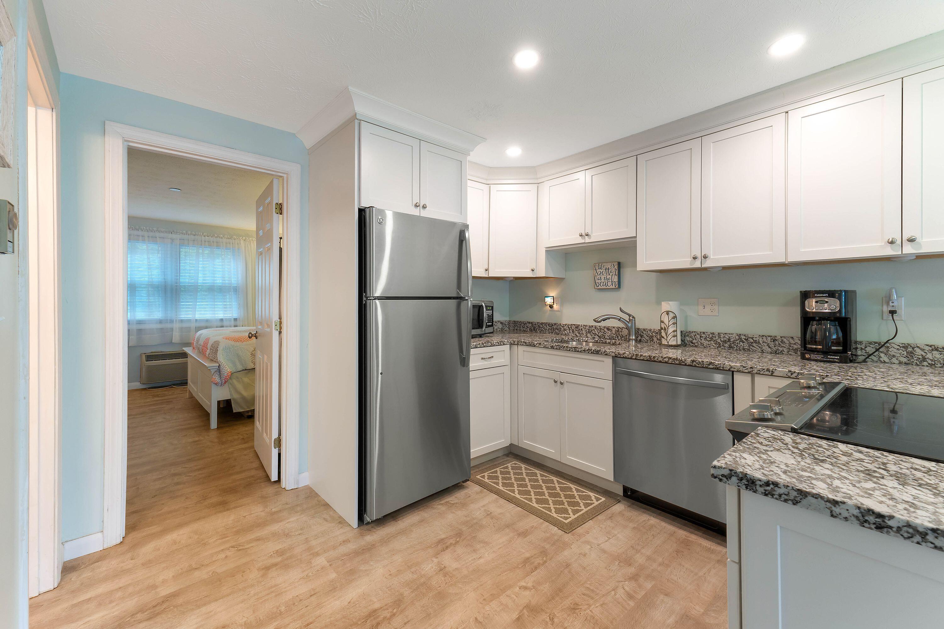 444 Main Street, Unit 110 Ogunquit, ME 03907 - Photo 8 of 19 Fully Renovated Stainless Steel Kitchen