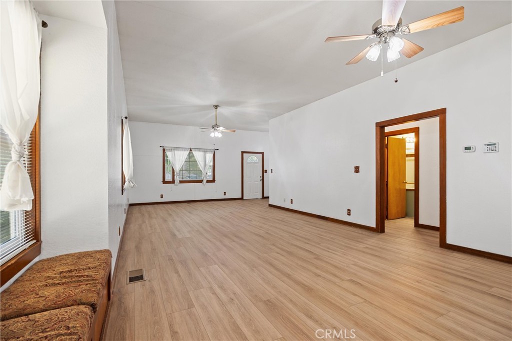 529 South Shasta Street Willows, CA 95988 - Photo 9 of 29 a view of livingroom with hardwood floor and ceiling fan