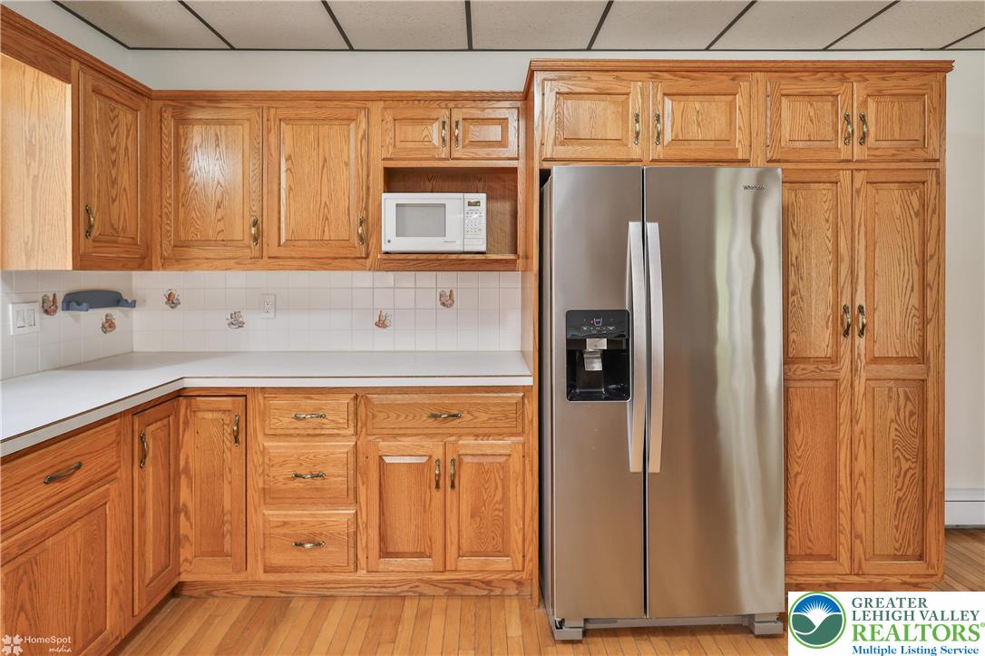 9160 Furnace Road Slatington, PA 18080 - Photo 28 of 52 a kitchen with stainless steel appliances granite countertop a refrigerator and a sink