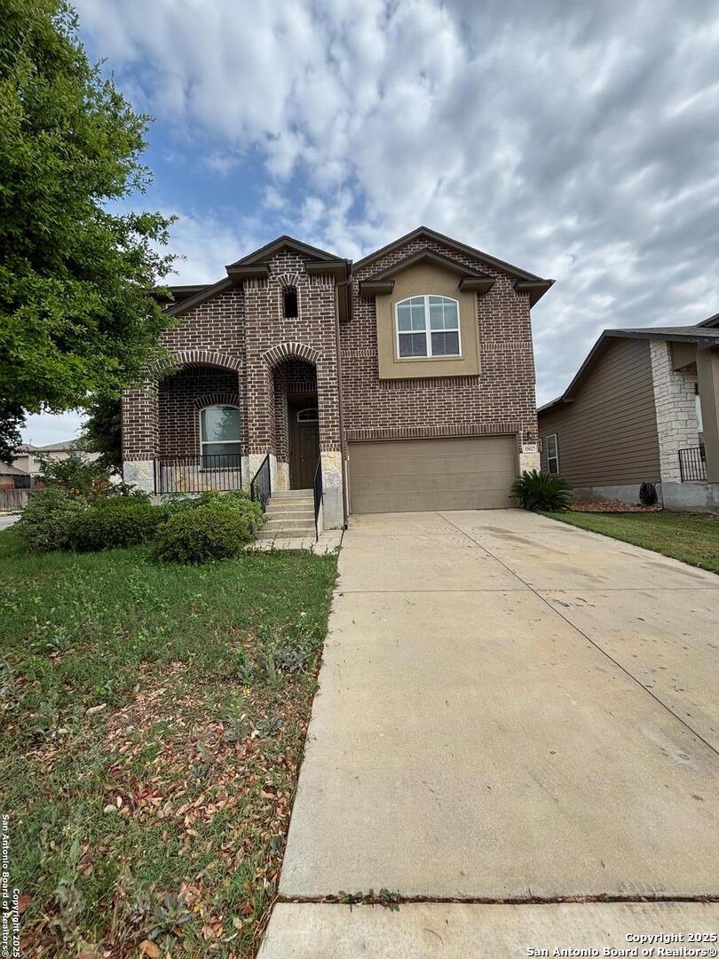 a house view with a garden space
