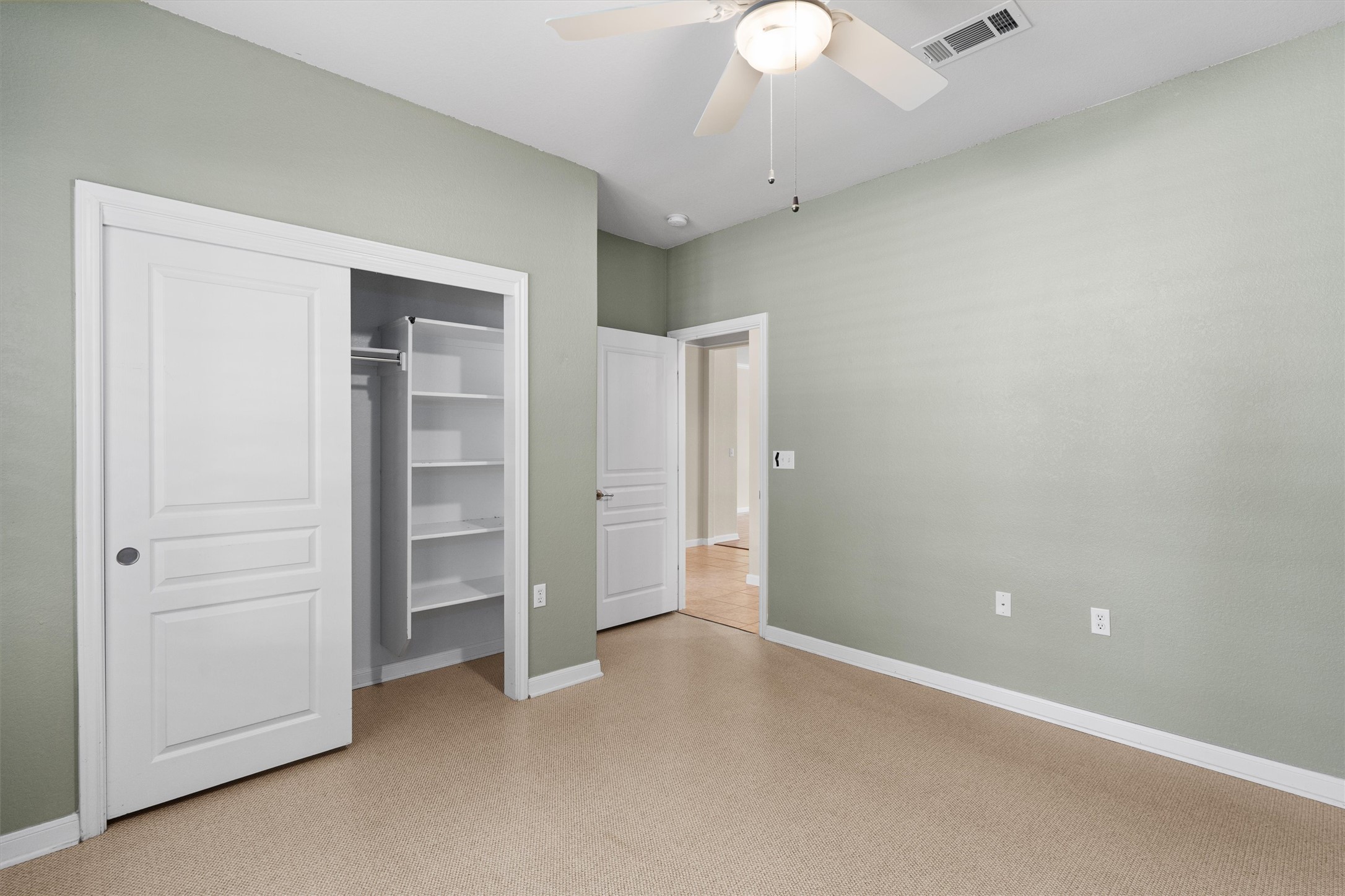 321 Yukon Terrace Georgetown, TX 78633 - Photo 8 of 15 an empty room with closet and windows