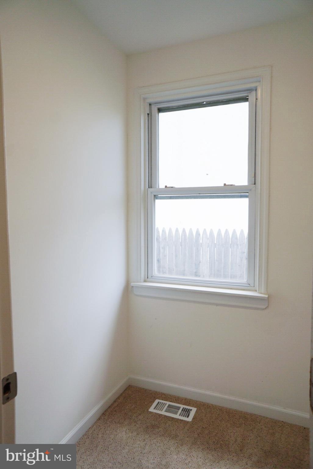 5215 Trumps Mill Road Baltimore, MD 21206 - Photo 14 of 27 MASTER WALK IN CLOSET W/ WINDOW