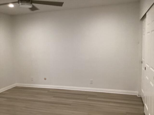 228 Eagle Lane Palmdale, CA 93551 - Photo 14 of 17 a view of a room with wooden floor