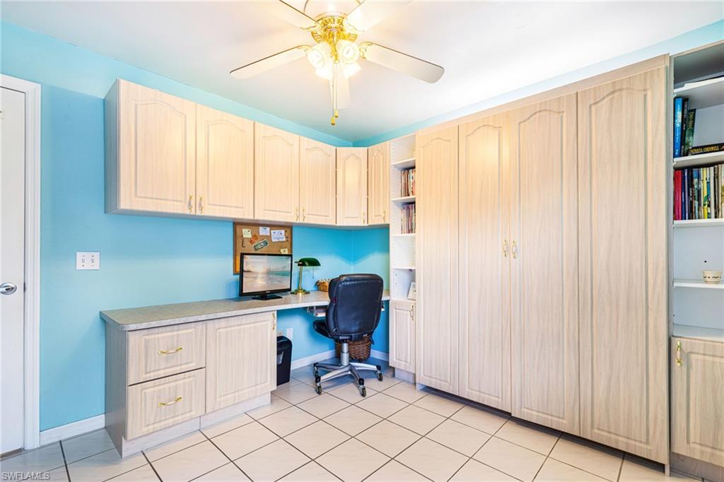 8241 Albatross Road Fort Myers, FL 33967 - Photo 24 of 48 a workspace with cabinets