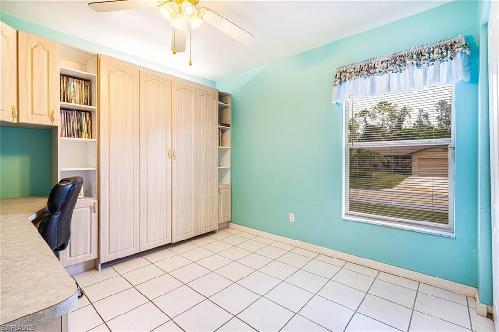 8241 Albatross Road Fort Myers, FL 33967 - Photo 25 of 48 a view of an empty room with a window