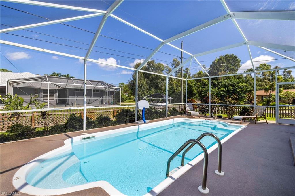 8241 Albatross Road Fort Myers, FL 33967 - Photo 3 of 48 a view of a swimming pool with a patio