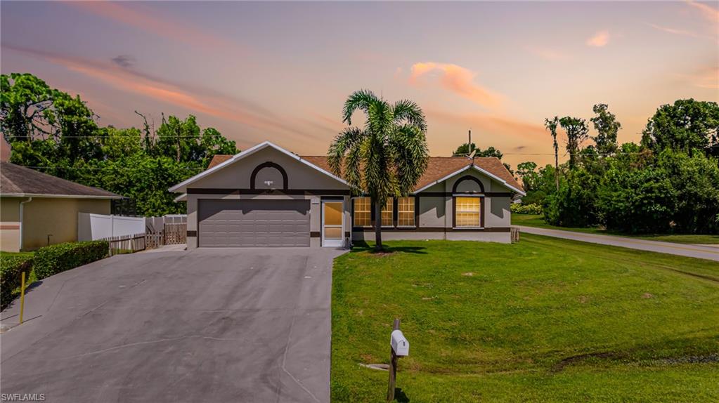8241 Albatross Road Fort Myers, FL 33967 - Photo 33 of 48 a view of house with garden