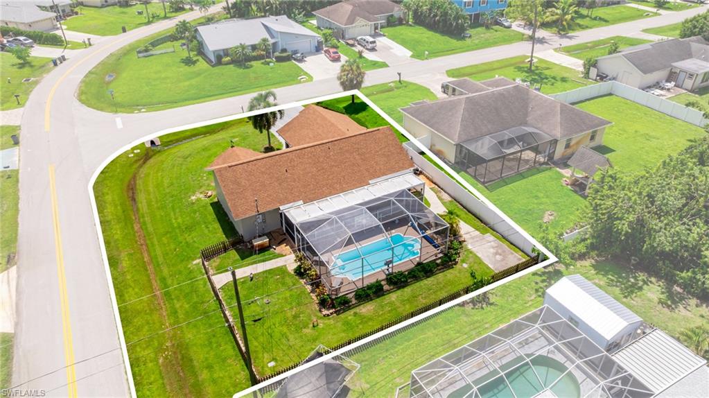 8241 Albatross Road Fort Myers, FL 33967 - Photo 45 of 48 an aerial view of a house with a big yard