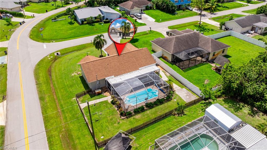 8241 Albatross Road Fort Myers, FL 33967 - Photo 46 of 48 an aerial view of a house with a big yard