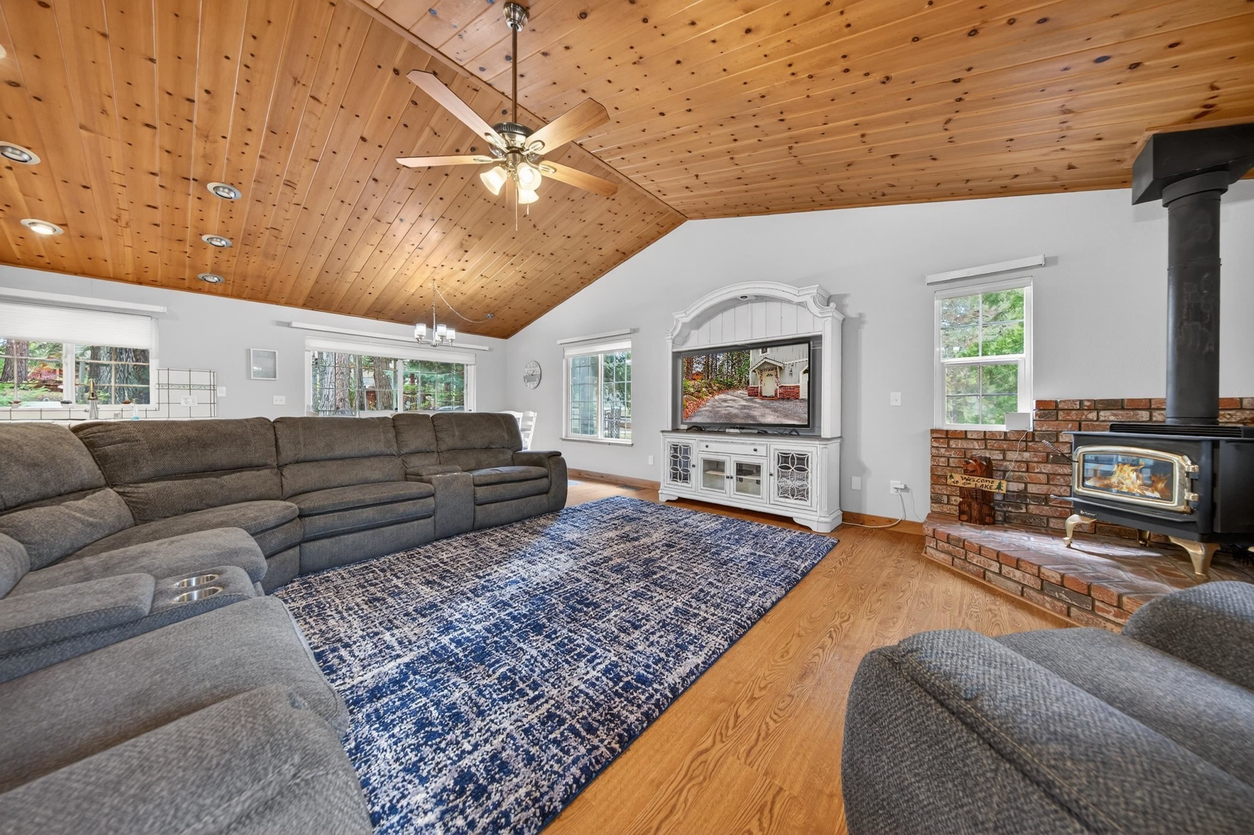 1220 Lynx Road Lake Almanor, CA 96137 - Photo 8 of 45 a living room with furniture and a flat screen tv