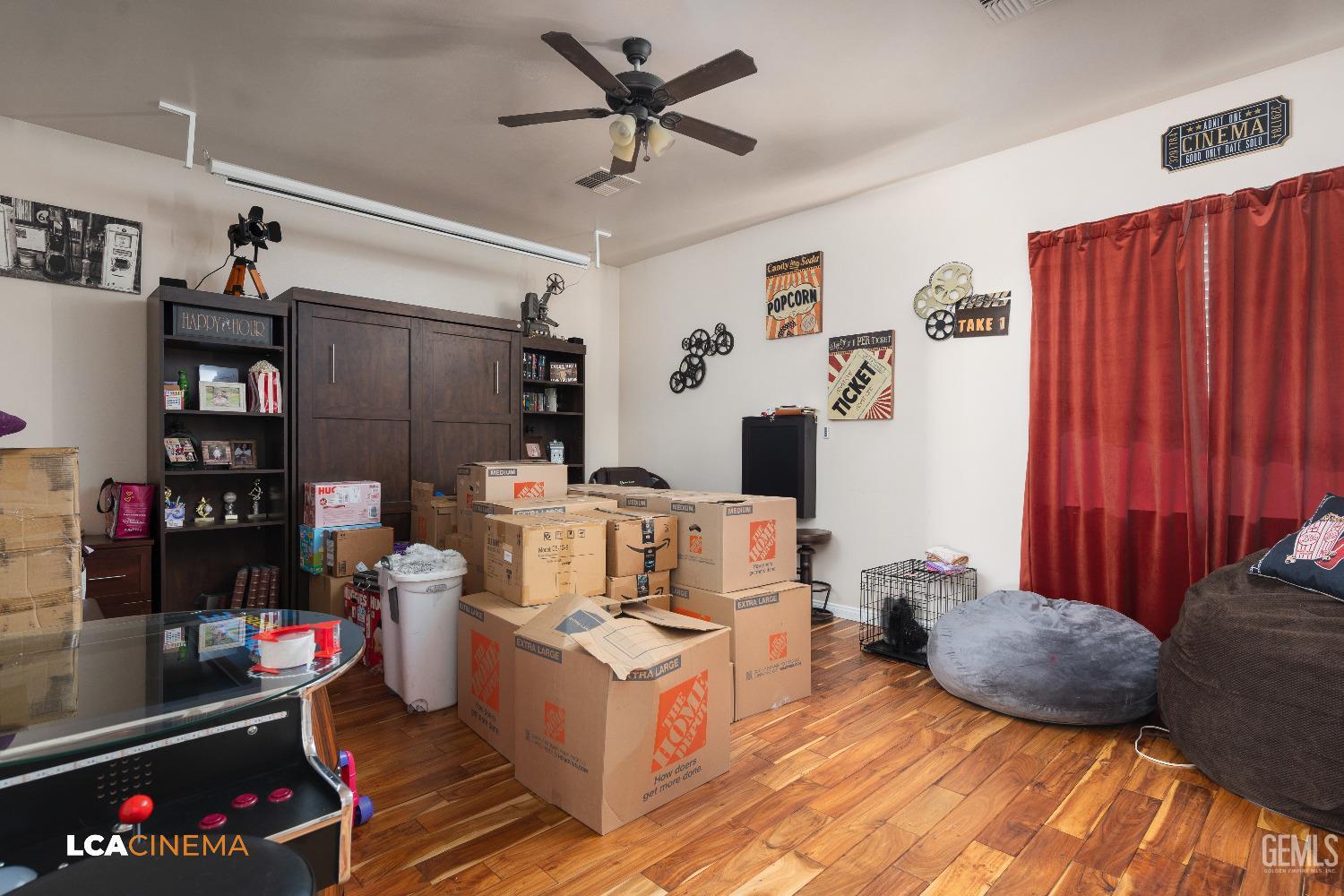 Undisclosed Address Shafter, CA 93263 - Photo 15 of 25 a living room with furniture and a flat screen tv