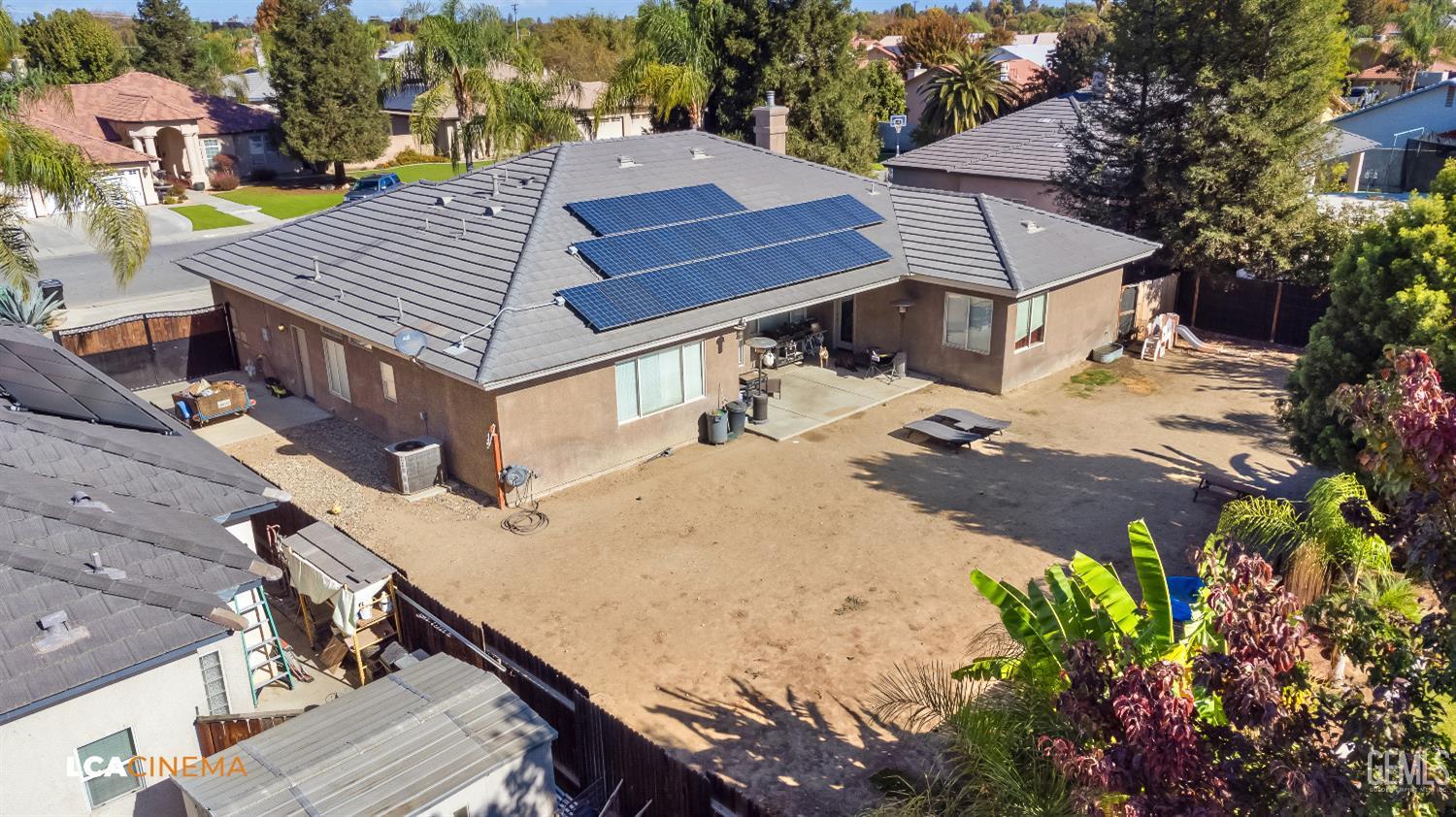 Undisclosed Address Shafter, CA 93263 - Photo 19 of 25 aerial view of a house with a yard and sitting area