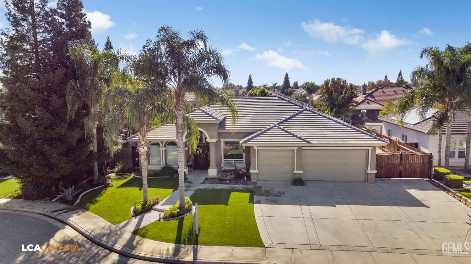 Undisclosed Address Shafter, CA 93263 - Photo 2 of 25 a view of a white house with a swimming pool and furniture