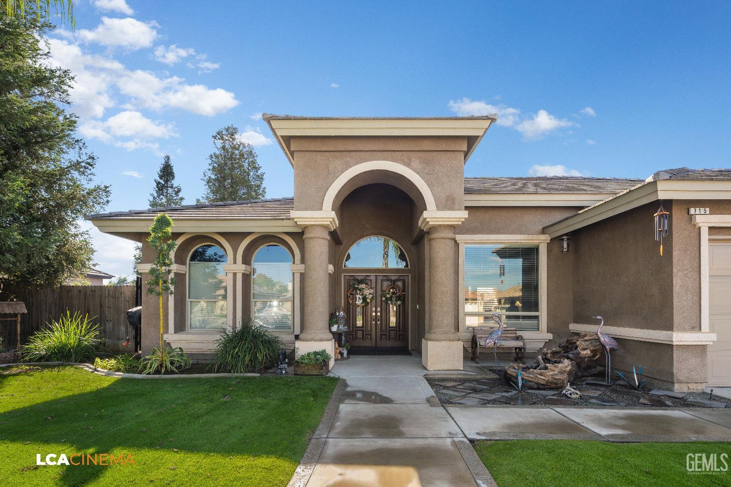 Undisclosed Address Shafter, CA 93263 - Photo 22 of 25 a front view of a house with garden