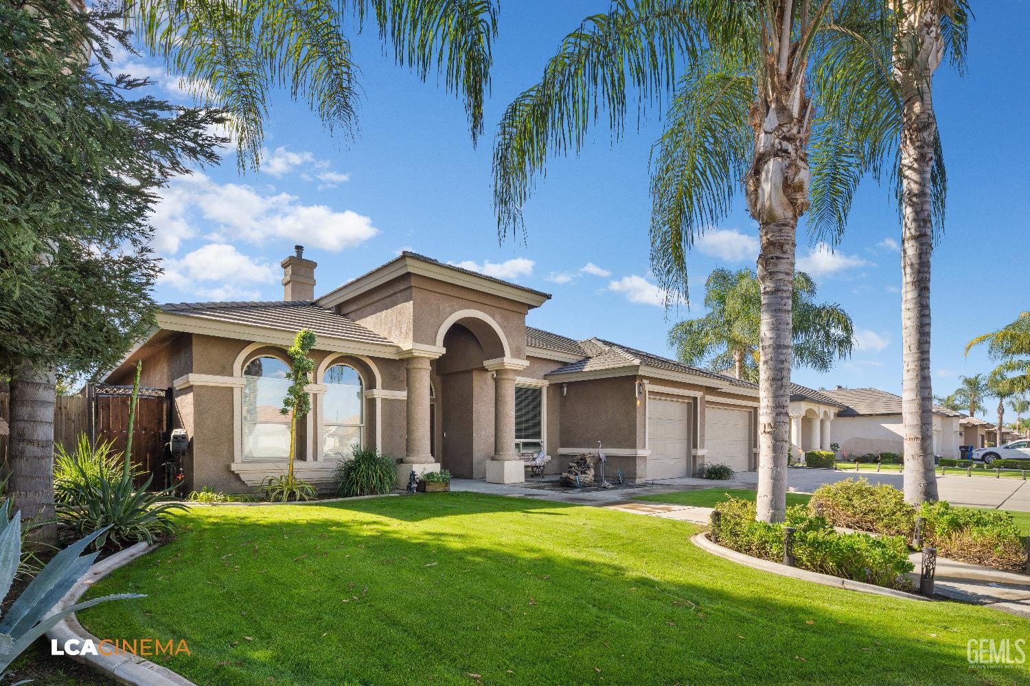 Undisclosed Address Shafter, CA 93263 - Photo 25 of 25 a front view of a house with a garden