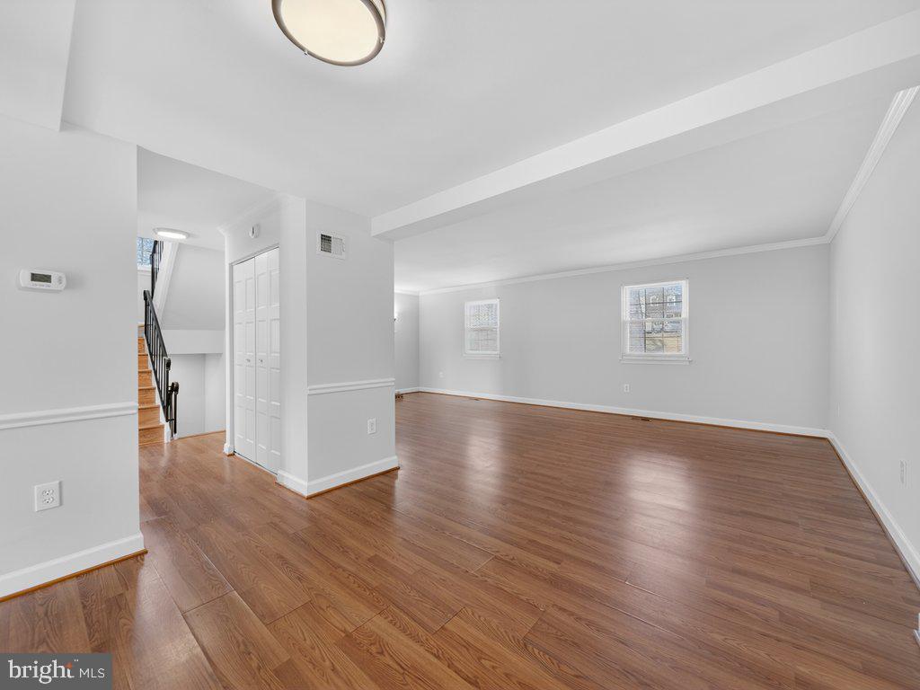 3827 Gawayne Terrace Silver Spring, MD 20906 - Photo 12 of 45 a view of livingroom with hardwood floor and a ceiling fan