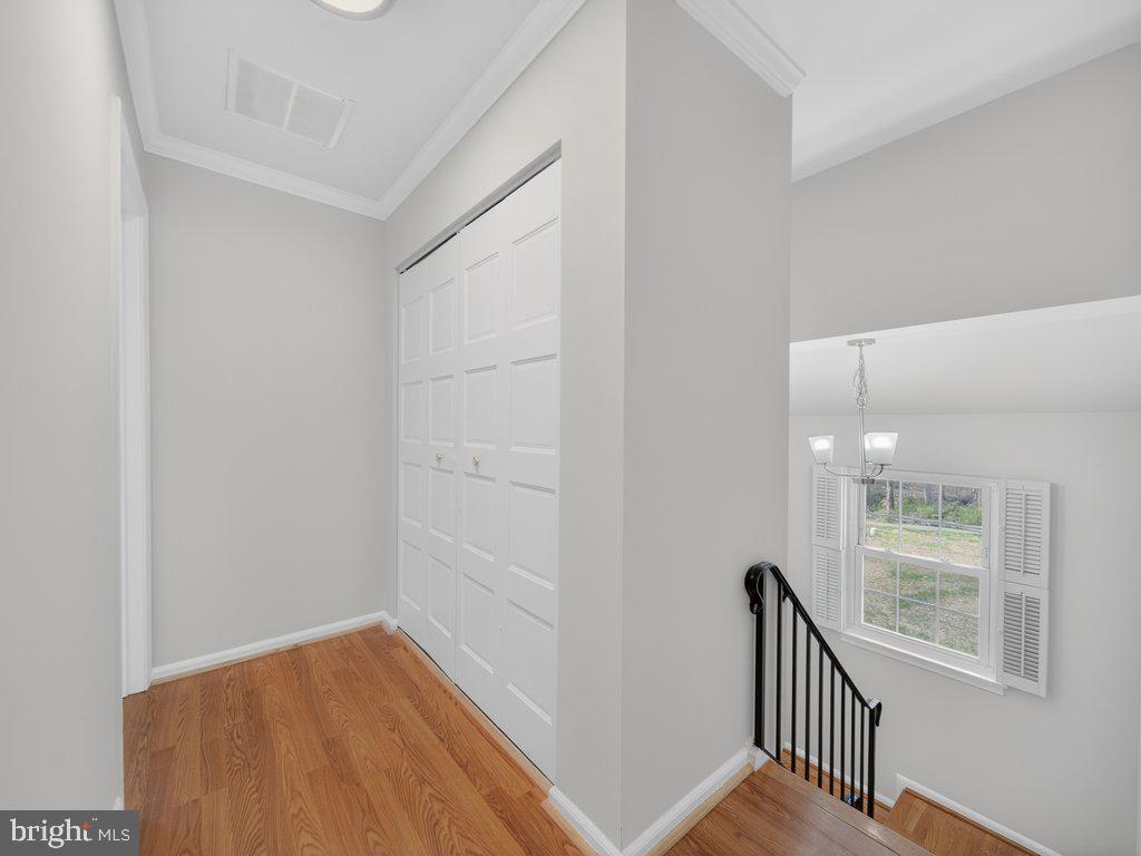 3827 Gawayne Terrace Silver Spring, MD 20906 - Photo 18 of 45 a view of empty room with wooden floor and fan